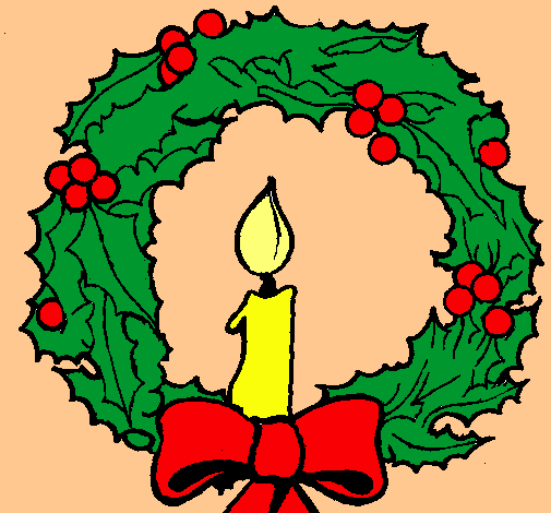 Corona de navidad y una vela