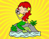 Dibujo Sirena sentada en una roca con una caracola pintado por pire
