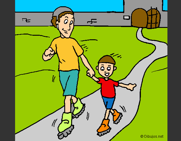 Padre le enseña a su hijo a andar en patines