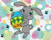 Dibujo Conejo con huevo de pascua pintado por elisa15