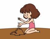 Dibujo Niña haciendo un castillo de arena pintado por AgusNet