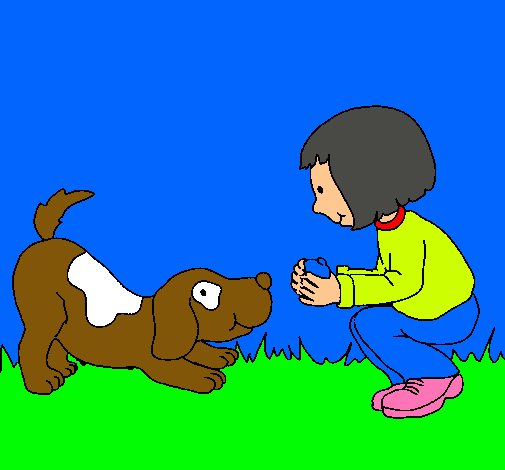 Niña y perro jugando