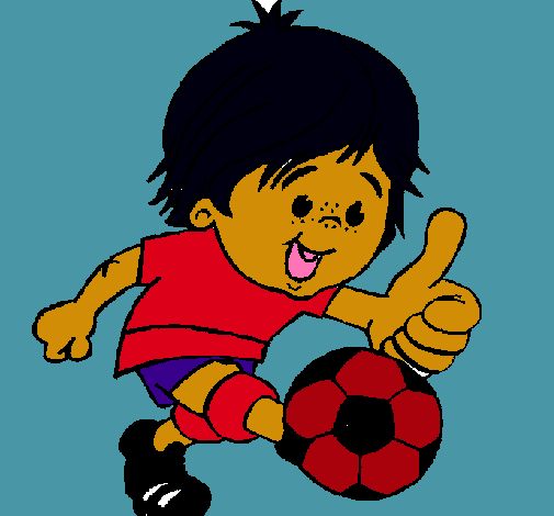 Chico jugando a fútbol