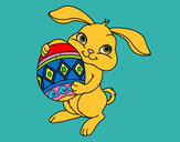 Dibujo Conejo con huevo de pascua pintado por amalia