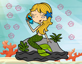 Dibujo Sirena sentada en una roca con una caracola pintado por luzkarina