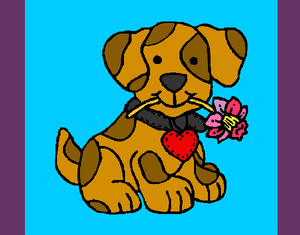 Cachorro con una flor en la boca
