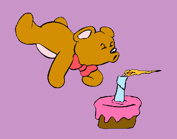 oso soplando una vela de cumpleaños