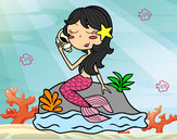 Dibujo Sirena sentada en una roca con una caracola pintado por manuely