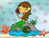 Dibujo Sirena sentada en una roca con una caracola pintado por hanniatron