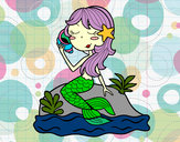 Dibujo Sirena sentada en una roca con una caracola pintado por periquita