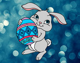 Dibujo Conejo con huevo de pascua pintado por superbea