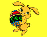 Dibujo Conejo con huevo de pascua pintado por amalia