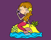 Dibujo Sirena sentada en una roca con una caracola pintado por rubielita