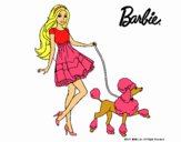 Barbie paseando a su mascota