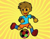 Jugador de fútbol con balón