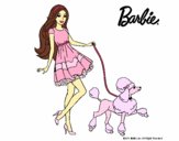 Barbie paseando a su mascota