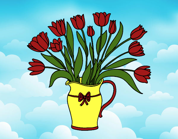 una jarra de flores rojas