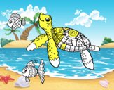 Tortuga de mar con peces