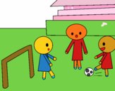 Niños jugando a futbol