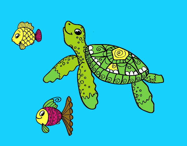 Tortuga de mar con peces