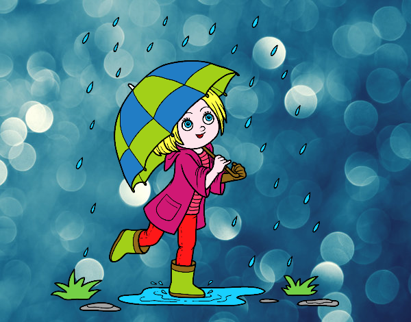 Niña con paraguas bajo la lluvia