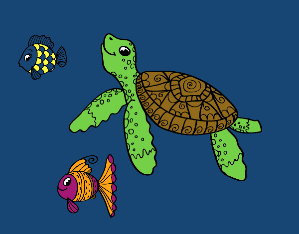 Tortuga de mar con peces