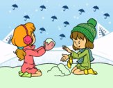 Niñas jugando con la nieve