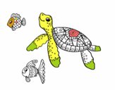 Tortuga de mar con peces