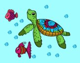 Tortuga de mar con peces