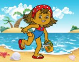 Niña con cubo y pala de playa