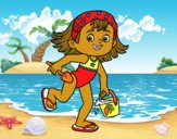 Niña con cubo y pala de playa