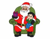 Papá Noel y niño en Navidad