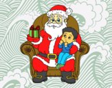 Papá Noel y niño en Navidad