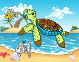 Tortuga de mar con peces