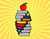 Libros y manzana