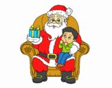 Papá Noel y niño en Navidad