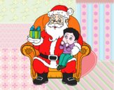 Papá Noel y niño en Navidad