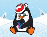 Un pingüino con regalo de Navidad