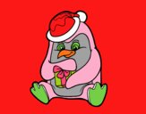 Un pingüino con regalo de Navidad