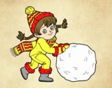 Niña con gran bola de nieve