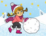 Niña con gran bola de nieve