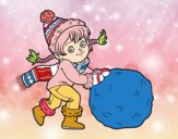 Niña con gran bola de nieve