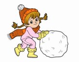 Niña con gran bola de nieve