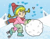 Niña con gran bola de nieve