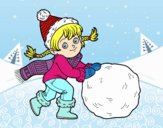 Niña con gran bola de nieve