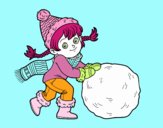 Niña con gran bola de nieve