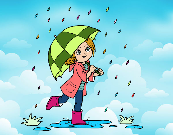 Niña con paraguas bajo la lluvia