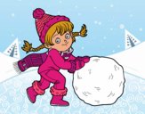 Niña con gran bola de nieve