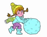 Niña con gran bola de nieve