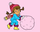 Niña con gran bola de nieve